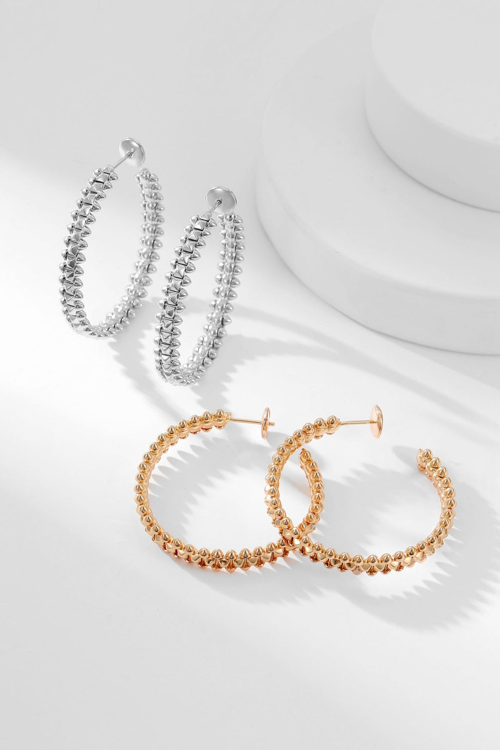 CARTIER CLASH HOOP EARRINGS